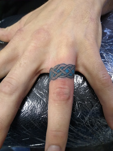 Explore flower back tattoo ideas, creative tattoo ideas in Owosso, available at Twisted ink tattoo