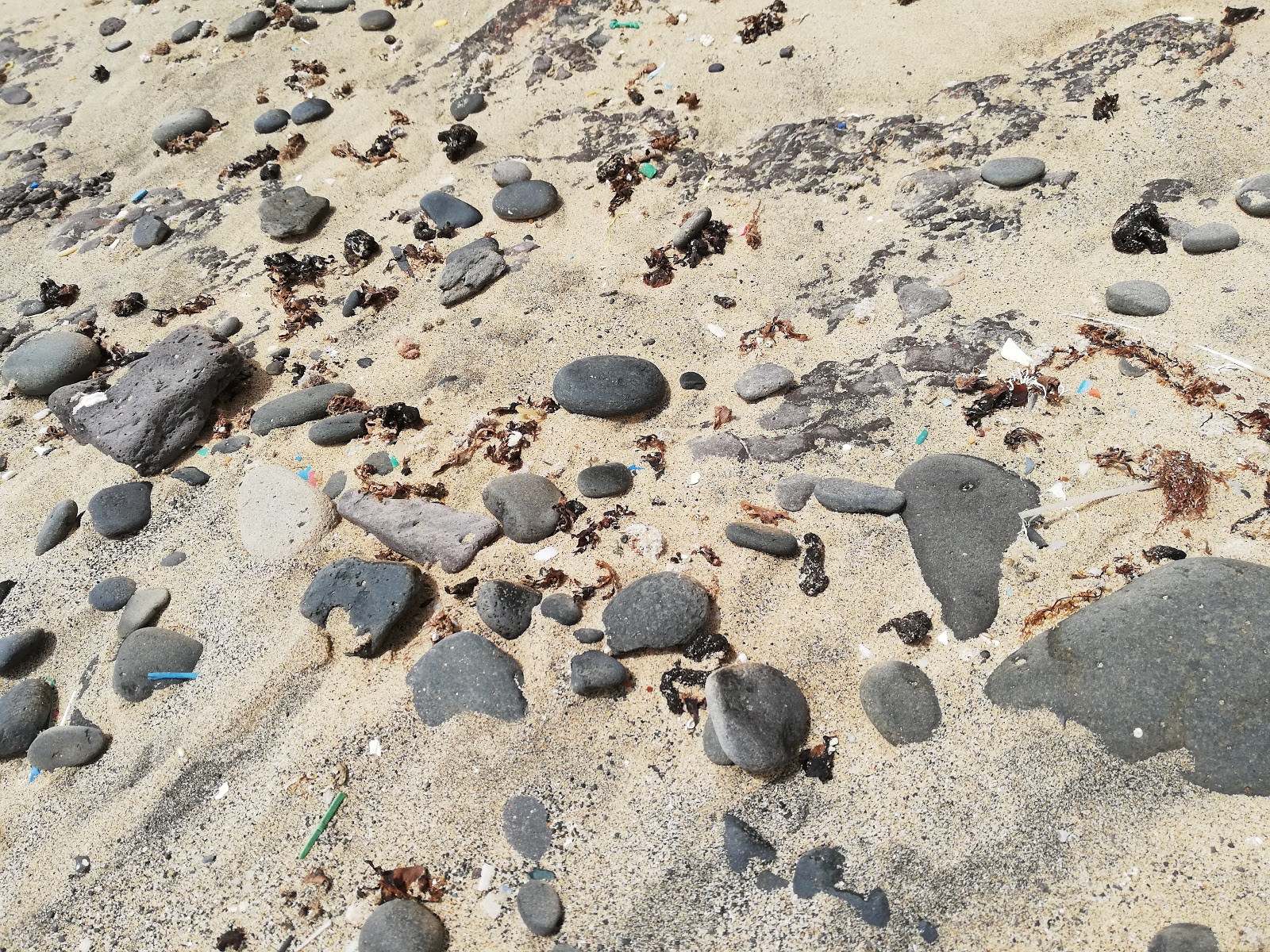 Foto von Playa de la Turbia mit teilweise sauber Sauberkeitsgrad