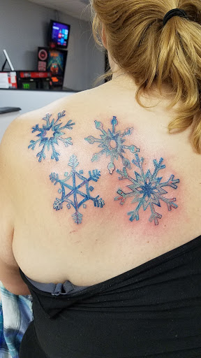 Explore tattoo ideas side stomach, creative tattoo ideas in Flint, available at Studio 42 Tattoo