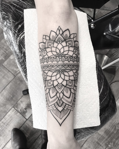 Explore tattoo ideas hunting, creative tattoo ideas in Lakeland, available at Black Swan Tattoo