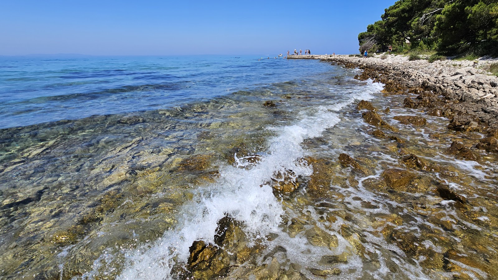 Lanterna Beach'in fotoğrafı - rahatlamayı sevenler arasında popüler bir yer