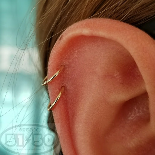 Explore endometriosis tattoo ideas, creative tattoo ideas in Kearney, available at Studio 5150 Piercing & Fine Jewelry