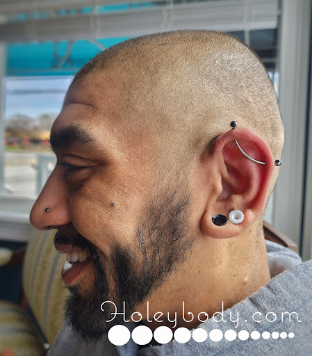 Explore damaged tattoo ideas, creative tattoo ideas in Saginaw, available at Holeybody