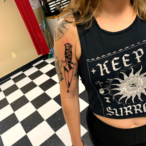 Explore dark romance book tattoo ideas, creative tattoo ideas in Augusta, available at Mr. Tattoo