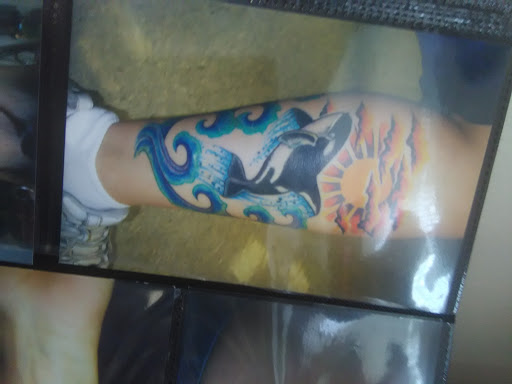 Tattoo Shop «Looking Glass Tattoo & Gallery», reviews and photos, 2110 SW Brandywine Ln #140, Topeka, KS 66604, USA