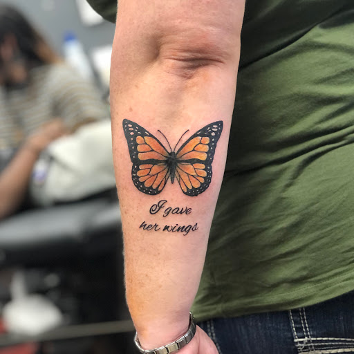 Explore esthetician tattoo ideas, creative tattoo ideas in Tampa, available at Atomic Tattoos North Tampa