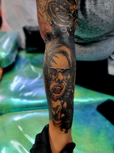 Explore small flowers tattoo ideas, creative tattoo ideas in Benton, available at Spectrum Tattoo