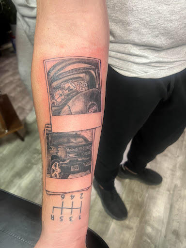 Explore cat and dog tattoo ideas, creative tattoo ideas in Linn Creek, available at Hillard Skillard Tattoos, LLC.
