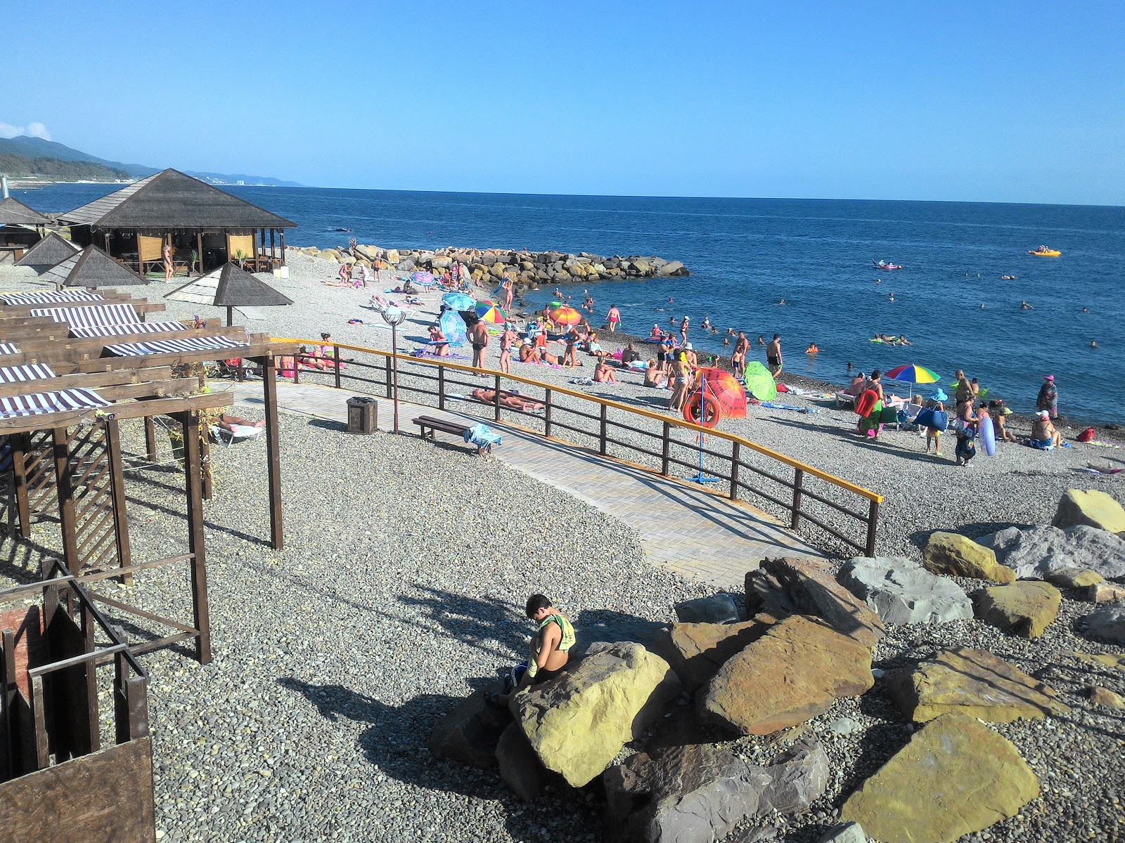 Fotografija Makopse beach z prostorni večplastni zalivi