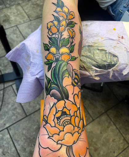 Explore sun tattoo ideas for men, creative tattoo ideas in Fort Wayne, available at Grade A Tattoos and Body Piercing