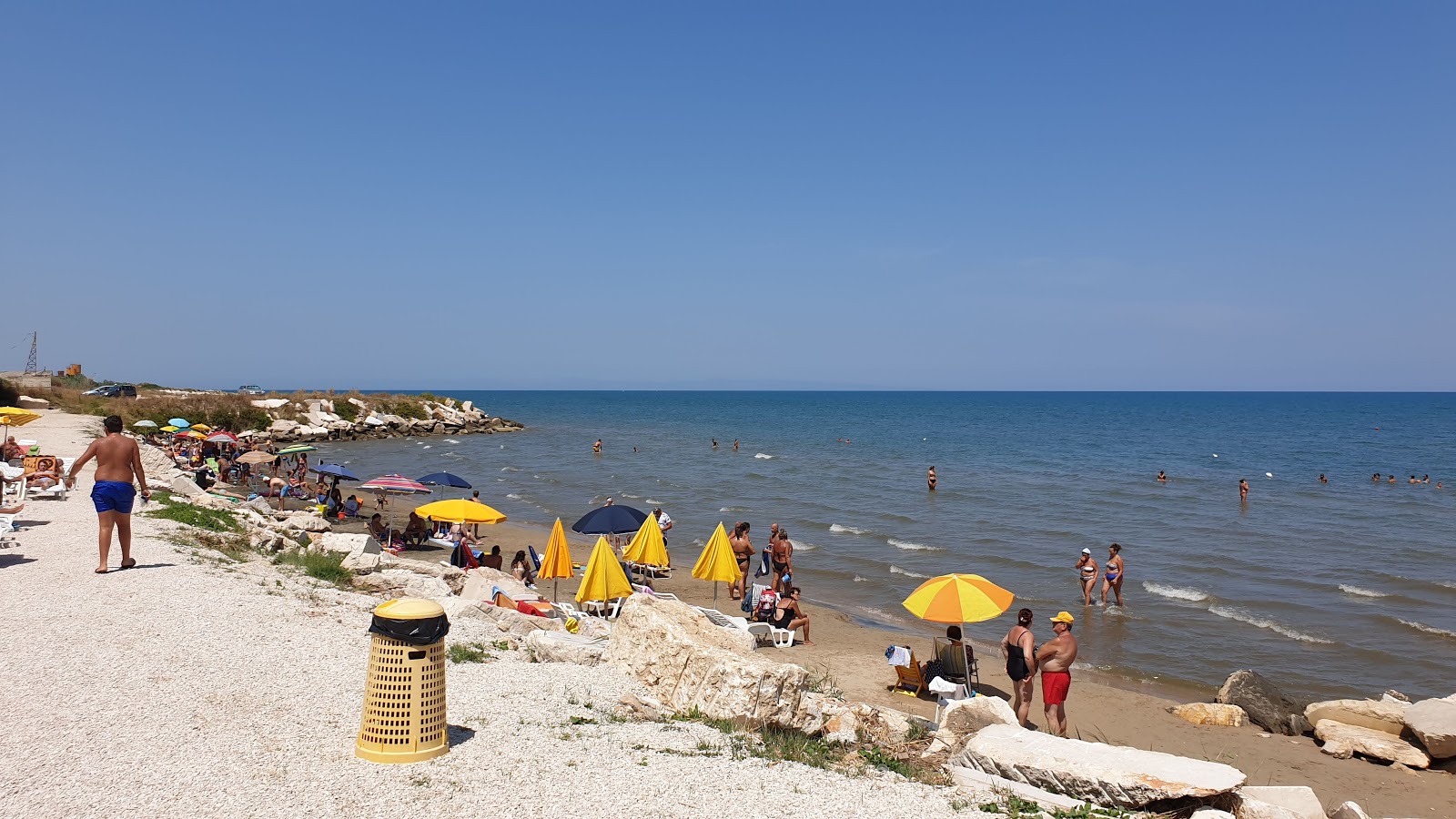 Fotografija Spiaggio San Marco Sud z svetel pesek površino
