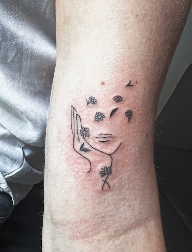 Explore tattoo ideas for biceps, creative tattoo ideas in Burley, available at Fine Line Ink