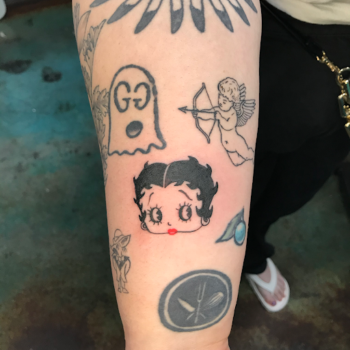 Explore throat tattoo ideas for females, creative tattoo ideas in Las Vegas, available at Las Vegas Tattoo Collective, LLC