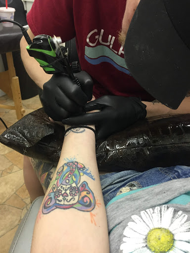 Explore wrestling tattoo ideas, creative tattoo ideas in Paris, available at Twizted Dezignz