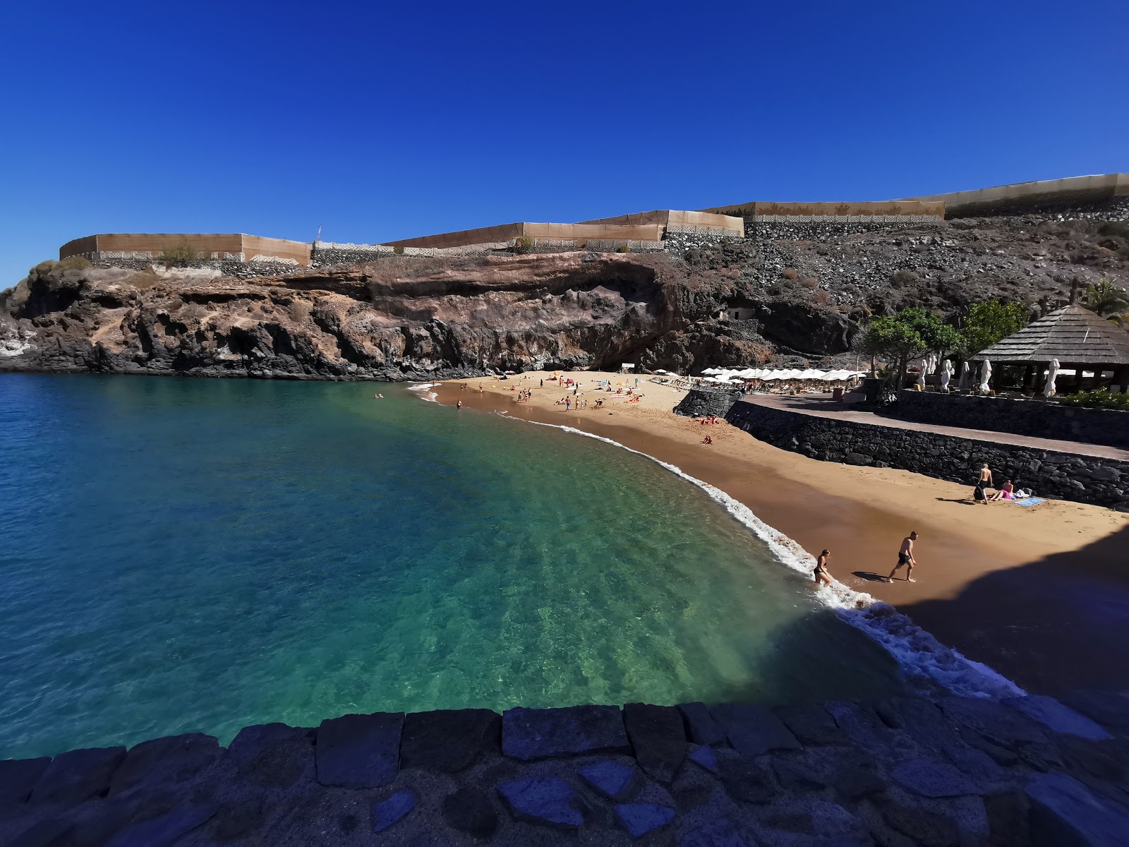 Foto van Abama Strand met kleine baai