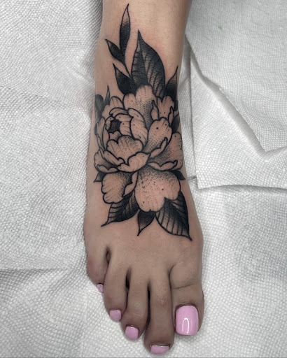 Explore back of head tattoo ideas, creative tattoo ideas in Johnson City, available at Gold Cross Tattoo Co.