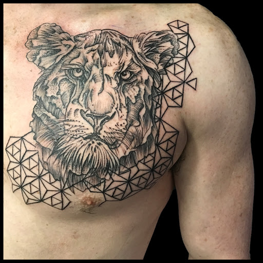 Explore women's half sleeve tattoo ideas, creative tattoo ideas in Homer, available at Exotic Eye Tattoo