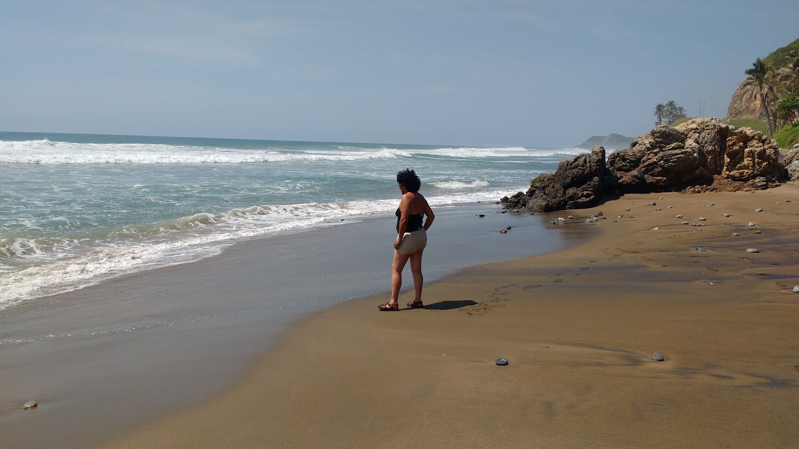 Playa Las Playitas的照片 带有长直海岸