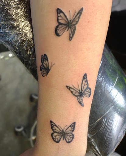 Explore mens space tattoo ideas, creative tattoo ideas in Marietta, available at The Painted Sparrow Tattoo Shop And Art Gallery