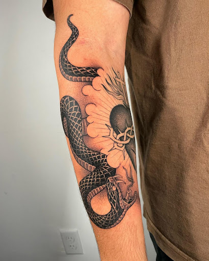 Explore jewelry tattoo ideas, creative tattoo ideas in Kissimmee, available at Fallen Sparrow Tattoo Co