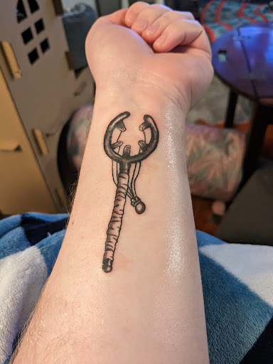 Explore notre dame tattoo ideas, creative tattoo ideas in Oviedo, available at Fine Ink Studios Tattoos