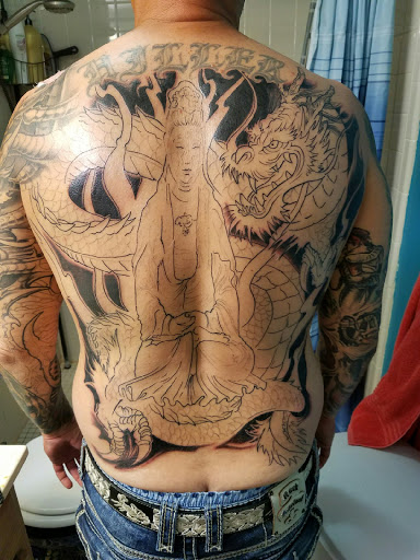 Tattoo Shop «magnum opus tattoo company», reviews and photos, 1817 Padre Blvd #4, South Padre Island, TX 78597, USA