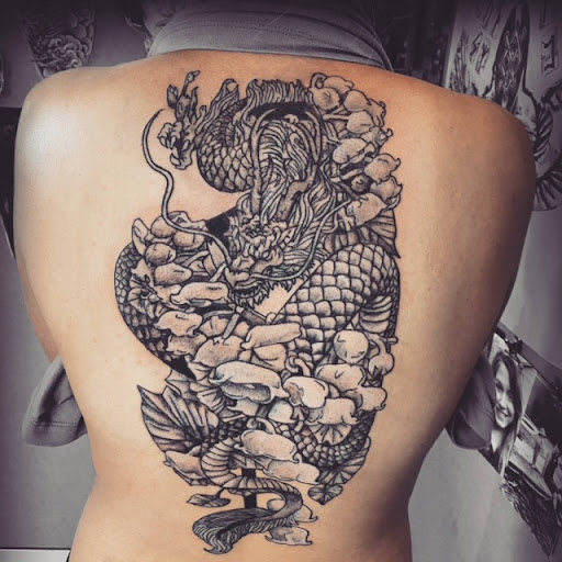 Explore tattoo ideas arm shoulder, creative tattoo ideas in Omaha, available at Caffeinated Caterpillar Tattoo Spa