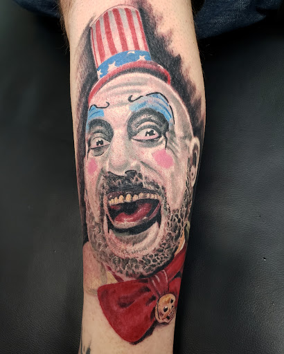 Explore flower tattoo ideas on arm, creative tattoo ideas in Redford, available at Empire Tattoo Studio