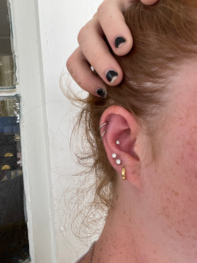 Explore child tattoo ideas, creative tattoo ideas in Magnolia, available at Lucky Sparrow Tattoo Shop and Piercing