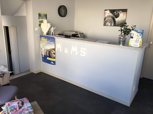 Photo 1 - M&M's garage