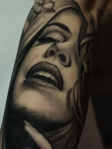 Find family of 4 tattoo ideas for your next unique tattoo in Montgomery at Flying Eye Tattoo Studio