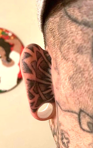 Explore dog tags tattoo ideas, creative tattoo ideas in Mayodan, available at Bleeding Ink Tattoo