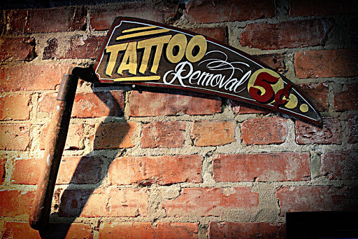 Explore father time tattoo ideas, creative tattoo ideas in Dunn, available at Heart and Hammer Tattoo Co.