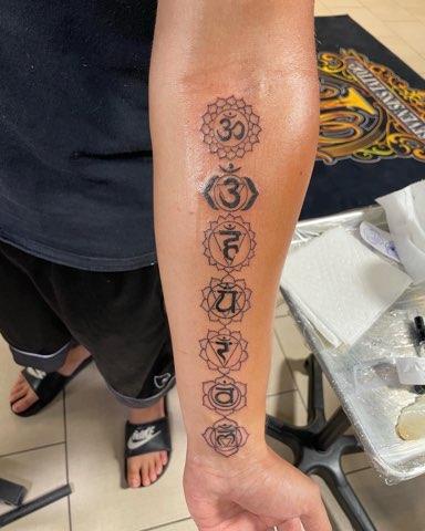 Explore black and red tattoo ideas, creative tattoo ideas in Sarasota, available at SEVEN SINS Tattoo Studio