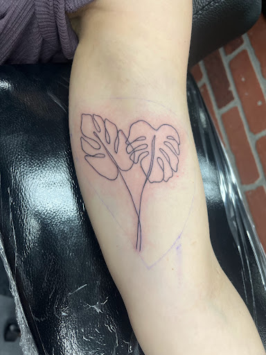 Explore book lover tattoo ideas, creative tattoo ideas in Lincoln City, available at Black N Blue Tattoo & Skate Shop