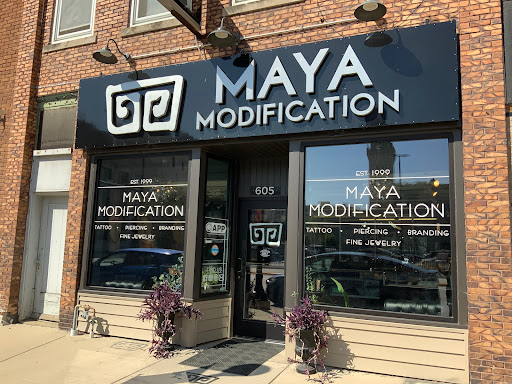 Find hand tattoo ideas for women for your next unique tattoo in Sioux City at Maya Modification