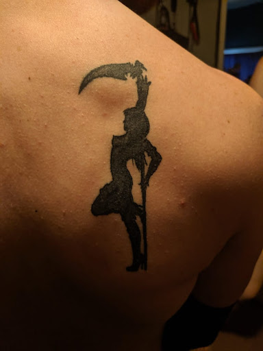 Explore traditional hand tattoo ideas, creative tattoo ideas in Cadillac, available at Warchief Tattoo, LLC