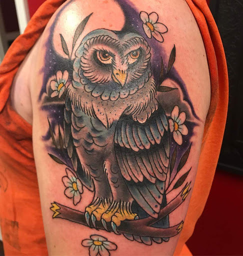 Explore knee tattoo ideas for woman, creative tattoo ideas in Powell, available at Against All Odds Tattoos and Piercings