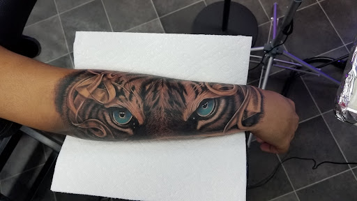 Explore tie dye tattoo ideas, creative tattoo ideas in Richmond, available at Captured Moment Tattoos