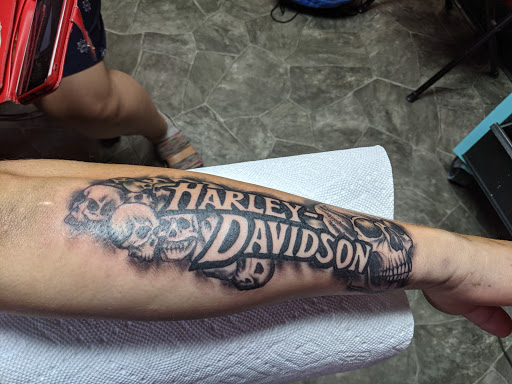 Explore cover up tattoo ideas female back, creative tattoo ideas in Knoxville, available at Hard Knox Tattoo