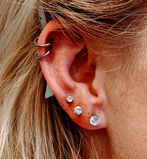 Explore tattoo ideas for men bicep, creative tattoo ideas in Saint George, available at Medusas Piercing Studio