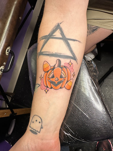 Explore spine tattoo ideas for females, creative tattoo ideas in Providence, available at East Coast Tattooing & Body Piercing