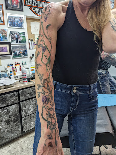 Explore bear tattoo ideas for guys, creative tattoo ideas in Hastings, available at A Plus Tattoo & Body Piercing