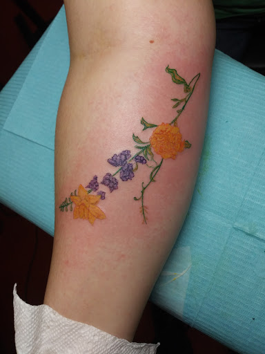 Explore tattoos for your son ideas, creative tattoo ideas in Dripping Springs, available at Hill Country Arts Piercings And Tattoos