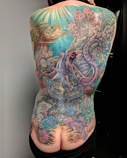 Explore globe tattoo ideas, creative tattoo ideas in Salt Lake City, available at SLC Ink Tattoo Salt Lake City, Utah