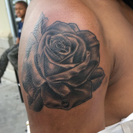 Explore religious chest tattoo ideas, creative tattoo ideas in Atlanta, available at Camp Creek Body Art & Laser