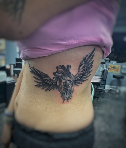 Explore tattoo on thigh ideas, creative tattoo ideas in North Fort Myers, available at Loyal 2 The Coil Tattoos & Body Piercings