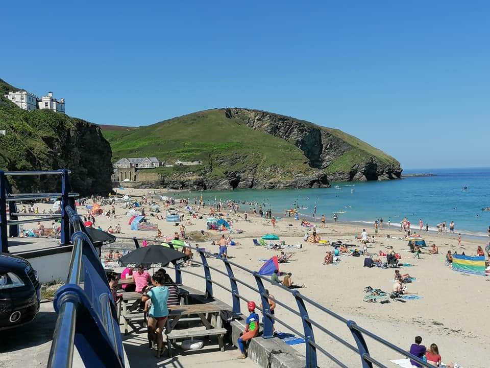Photo of Portreath Beach with turquoise water surface