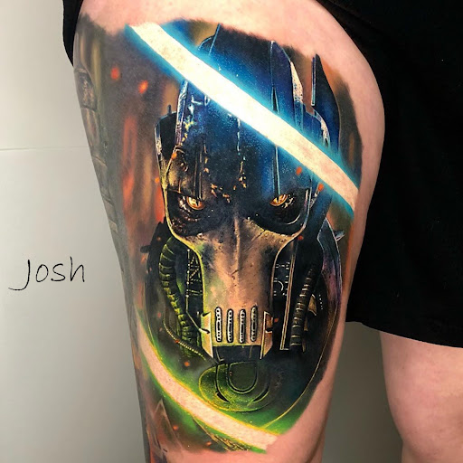 Explore blue bird tattoo ideas, creative tattoo ideas in Sanford, available at Venom Ink Tattoo