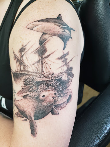 Find playboy bunny tattoo ideas for your next unique tattoo in North Bend at The Rusty Needle Tattoo Parlor